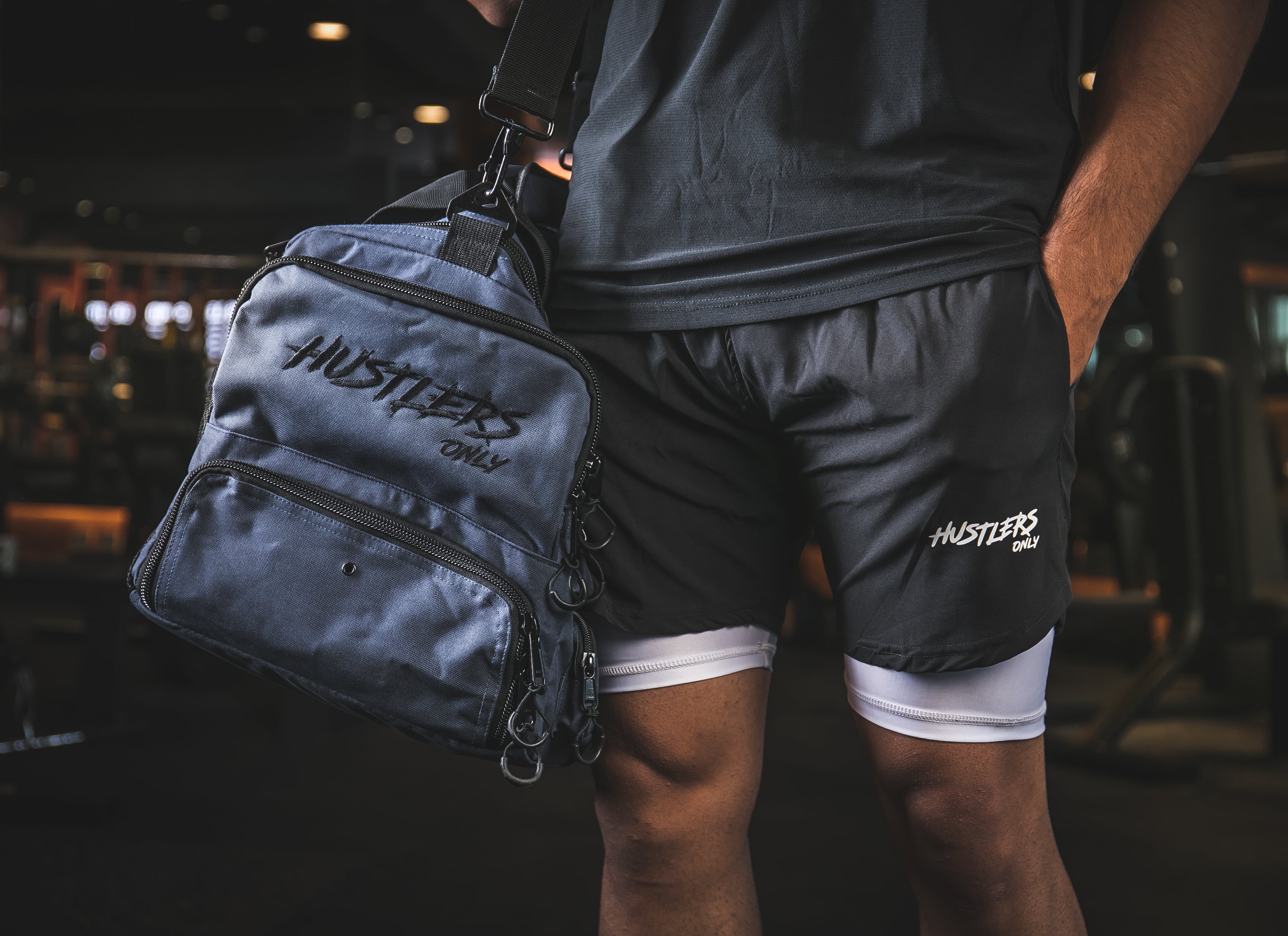 Men in Shorts hanging Gym Duffel Bag | HustlersOnlyUK